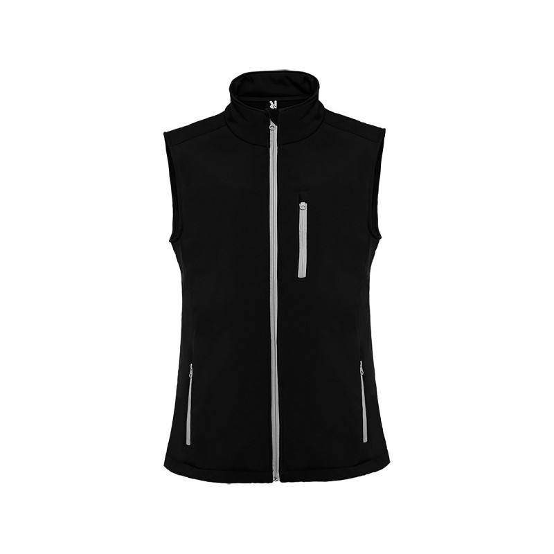 Gilet Giubbetto soft shell composto di due strati.1.- Cerniera lunga protetta e tiretto.2.- Tre tasche con cerniera protetta e 