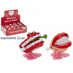 salterino wind up a carica dentiere kiss